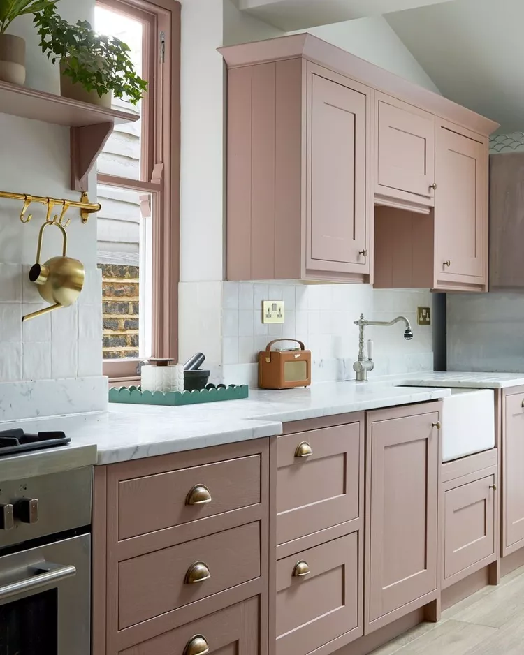 Baby Pink Cabinets with Contrasting Hardware